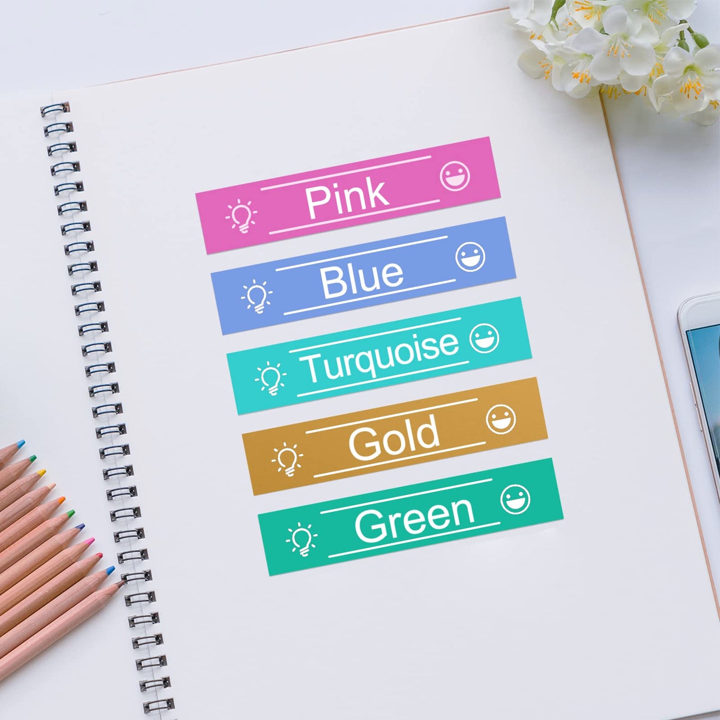 COLORTY colourful D1 laminated label tape sample display, five bright coloured self-adhesive tags printed with names and cute icons for notebook content classification, aesthetic planner decorative label refills
